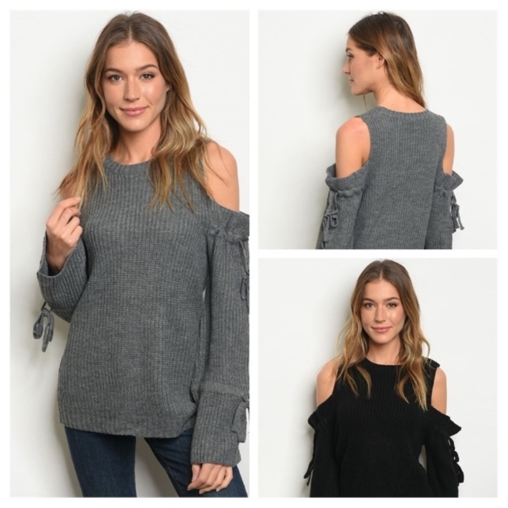 Cold shoulder bell sleeve sweater.